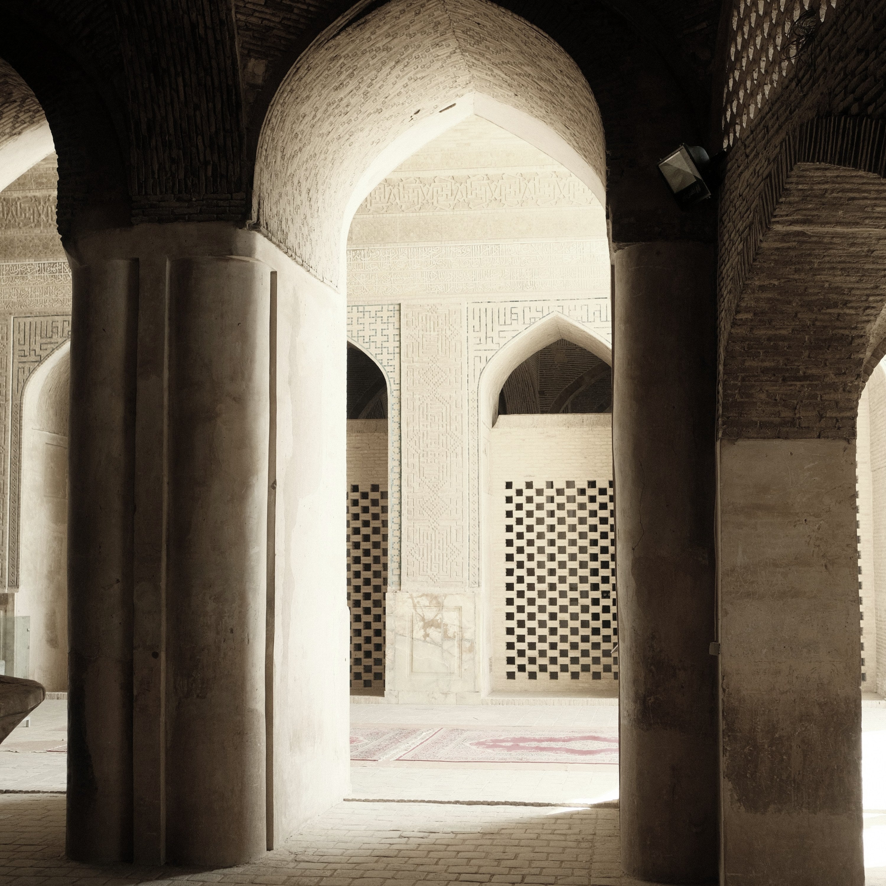 A columned stone passageway in Isfahan, Iran, the inspiration for LUMIRA Persian Rose